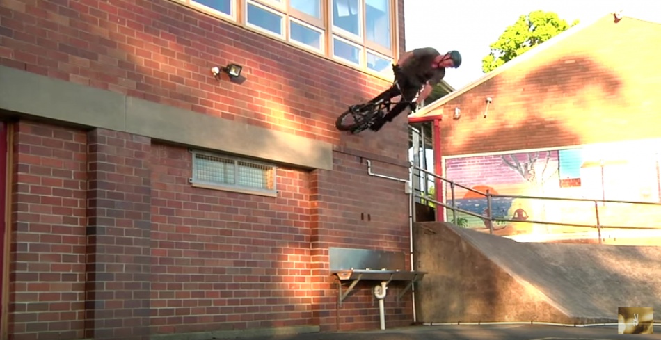 Boyd Hilder ready to go 180 out of this wallride.