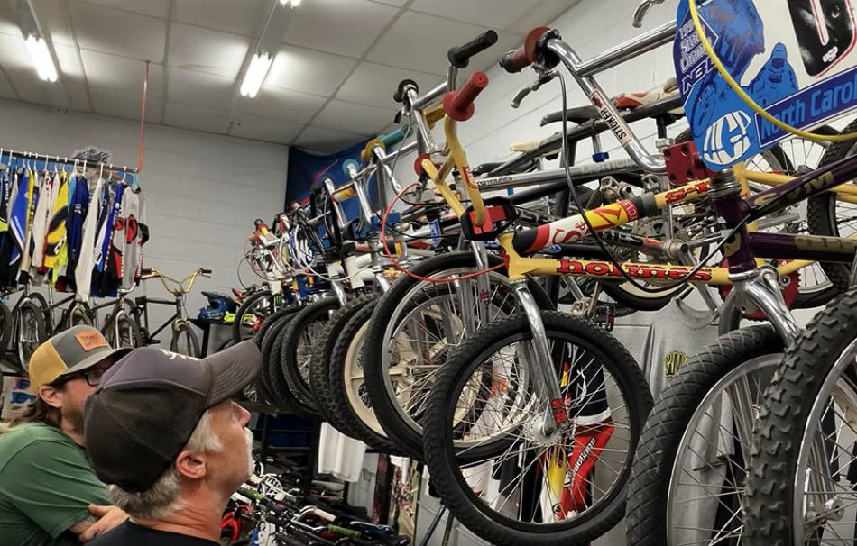 Chris Moeller of S&amp;M bikes walks thru the Powers BMX museum. By PowersBMX